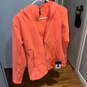 The North Face windwall jacket runs a little big